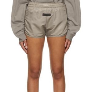 Essentials running shorts come with tags